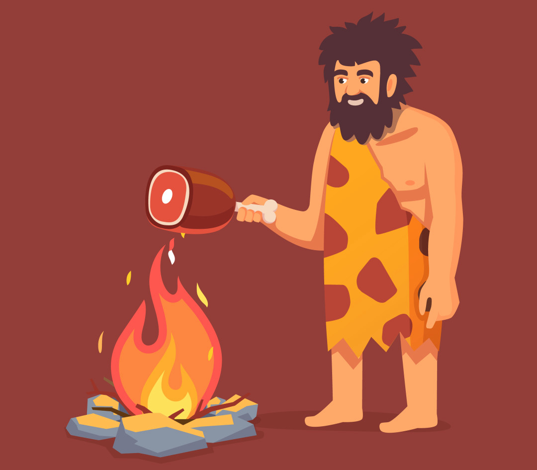 Древний человек жарит мясо