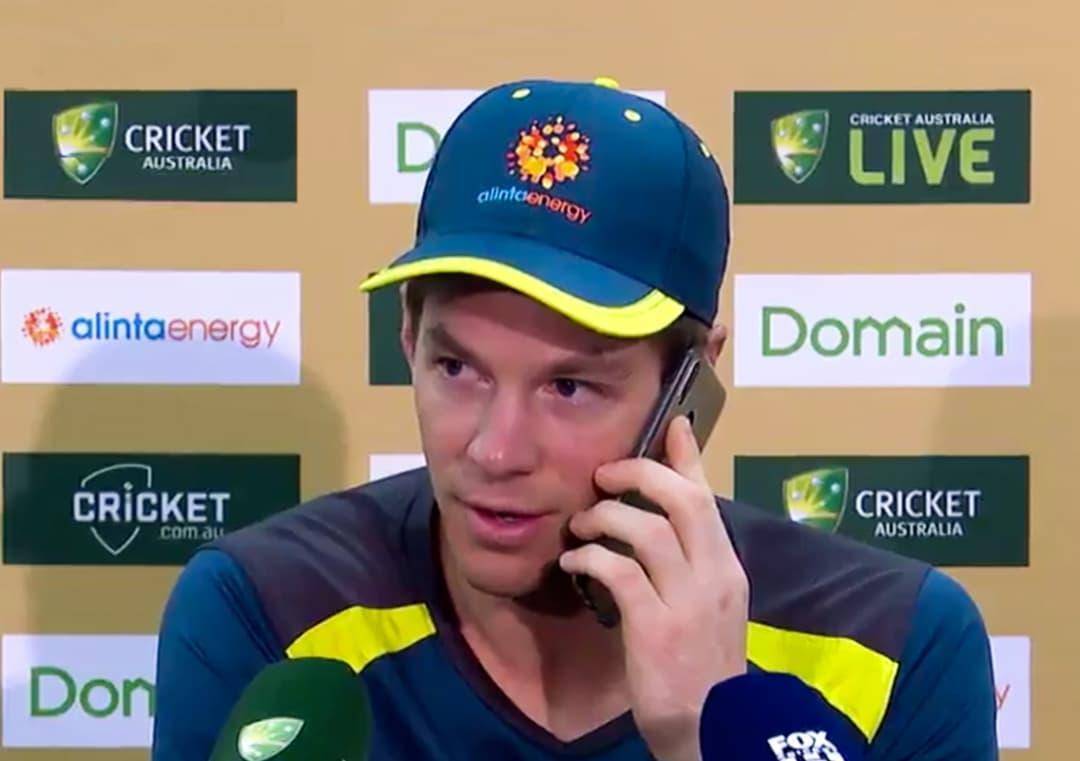 Aus captain Paine answers journalist's phone at press conference
